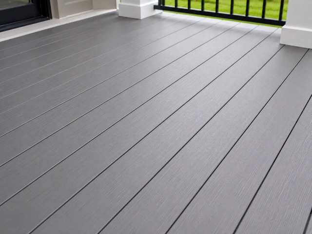 Cool-gray PVC deck boards with hidden fasteners