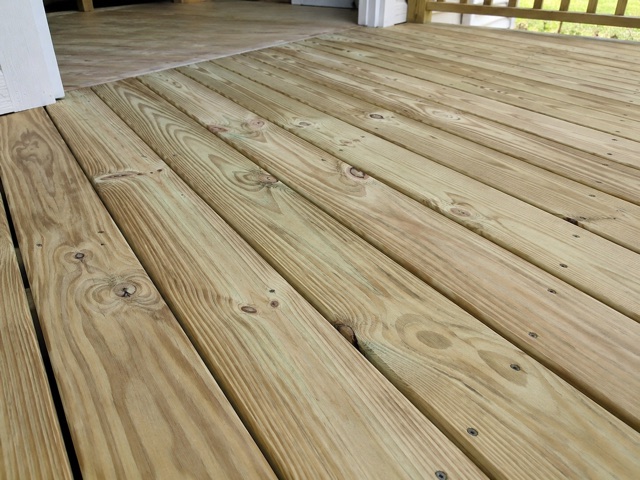 Honey-toned pressure-treated deck boards